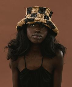 A playful crochet bucket hat that is sure to become your new fave travel companion. Crafted from fine paper straw, the flexible weave allows this bucket hat to be styled multiple ways, making it the must-have accessory for any poolside, beachside, festival + activity.