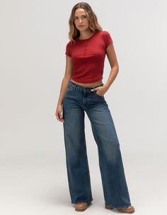 Wrangler Low Rise Baggy Jeans. Zip Fly And Button Closure. Belt Loop Waist. Traditional Five Pocket Styling. Low Rise. Baggy Straight Leg. Medium Wash. Approx. Inseam: 32''.99% Cotton, 1% Elastane. Machine Wash. Imported. Model Is Wearing A Size 25. Model Measurements:height: 5'9" Bust: 32"waist: 25"hips: 35" Low Rise Jeans Outfit Inspiration, Flowy Jeans Outfit, Medium Rise Jeans, Low Waist Wide Leg Jeans Outfit, Straight Leg Jeans Low Rise, Mid Rise Baggy Jeans Outfit, Low Rise Straight Leg Jeans Outfit, How To Style Low Rise Baggy Jeans, Casual Cotton Jeans With Snap Buttons