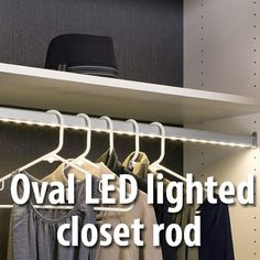 there is a shelf with clothes on it and the words oval led lighted closet rod