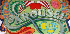 a colorful sign with the word carousel painted on it