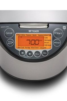 an image of a digital pressure cooker with timers on the front and side