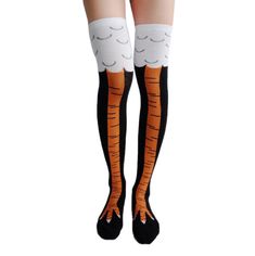 the legs of a woman wearing knee high socks with orange and white stripes on them