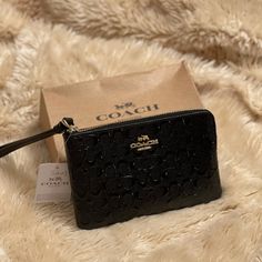 New Black Coach Wristlet, Great Monogram Detail Mini Coach Wallet, Black Coach Wallet, Wristlet Aesthetic, Baddie Purses, Baddie Accessories, Designer Wristlet, Coach Wristlet Wallet, Xoxo Jewelry, Bag Closet