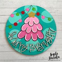 a happy birthday sign with a pink flower on it