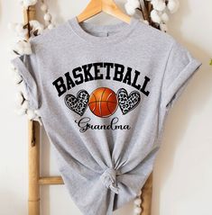 ✨DESCRIPTION: Basketball Mom Shirt, Basketball Grandma T-shirt, Basketball Tshirts, Grandma Shirt, Mother's Day Gift, Mom Gift, Sport Mom, Sport Girl, Sport Aunt, Sport GiGi, Custom Text on T-shirt D266 ✨HOW TO ORDER💕 1. Choose SIZE and Color  2. Use the personalization option to customize your shirt, if not you can leave it blank. 3. For multiple sizes please add them one by one to your cart and then checkout. 4. Be sure you indicated the CORRECT SHIPPING ADDRESS when placing the order. ✨SIZIN Basketball Grandma Shirt, Basketball Grandma Shirt Ideas, Girl Sport, Sport Mom, Basketball Shirts