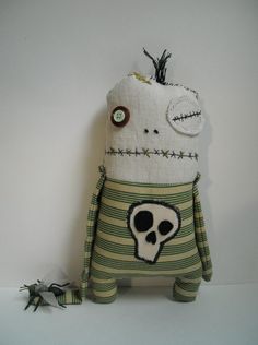 a stuffed toy with a skeleton on it's back