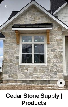 a stone house with the words cedar stone supply products on it's front and side