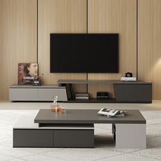 a living room with two tables and a television