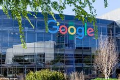 an office building with the google logo on it's glass front wall and trees in front