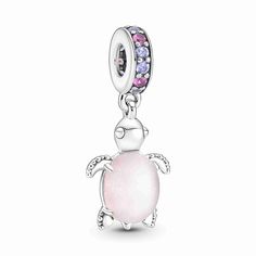 Our much-loved sea turtle charm is joined by a new friend in frosted pink. This sterling silver dangle charm features pink and purple man-made crystals on the bail and frosted Murano glass as its shell with unique shimmering flecks that catch the light. The belly of the sea turtle has a sterling silver cut-out pattern with an off-center heart to create a pretty scale-like effect. Carry more turtle friends on your Pandora Moments bracelet or charm holders. Pink Sea Turtle, Pandora Charms Pink, Pandora Bracelet Charms Ideas, Pandora Murano, Pandora Pink, Pink Charm, Pink Sea, Charms Pandora, Bracelet Pandora