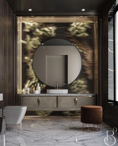 an elegant bathroom with marble floors and walls