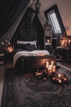 a bedroom with lots of candles on the floor