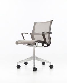 an office chair with wheels on the back and seat upholstered to the side