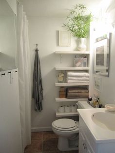 the bathroom is clean and ready to be used as a storage space for toiletries