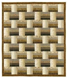 a brown and beige rug with squares on it's sides, in the shape of rectangles