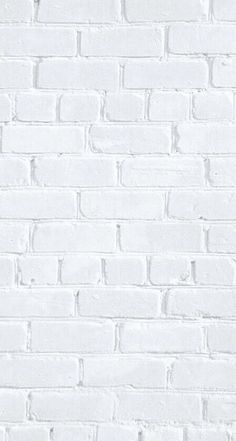 a white brick wall with no mortars on it