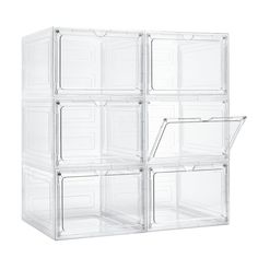 four clear plastic storage containers stacked on top of each other