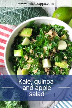 kale, quinoa and apple salad in a bowl with limes on the side