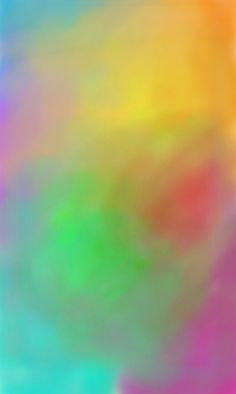 a blurry image of multicolored clouds in blue, green, yellow and pink