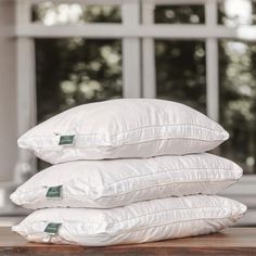 three pillows stacked on top of each other