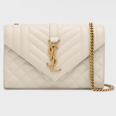 Color: Cream / Blanc Vintage Condition: New. Worn Once. As New. Pristine Condition. Comes With Dust Bag, No Box. Saint Laurent Shoulder Bag In Quilted Leather Features Signature Ysl Logo Accent Sliding Chain Shoulder Strap, 21.6"L Envelope Flap Top With Magnetic Closure Interior, One Card Slot Golden Hardware Approx. 5.1"H X 8.2"W X 2.3"D Made In Italy Ysl Envelope Bag, Ysl Shoulder Bag, Womens Designer Handbags, Yves Saint Laurent Bags, Colorful Bags, Top Handle Handbags, Envelope Bag, Pretty Bags, Backpack Tote Bag