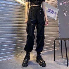 ⚜ Women's Gothic Techwear Cargopants Japanese Streetwear ⚜ - cotton material - comfortable - loose cargopants - available in black ▶ 𝗣𝗟𝗘𝗔𝗦𝗘 𝗙𝗢𝗟𝗟𝗢𝗪 𝗧𝗛𝗘 𝗠𝗘𝗔𝗦𝗨𝗥𝗠𝗘𝗡𝗧𝗦 𝗜𝗡 𝗧𝗛𝗘 𝗦𝗜𝗭𝗘 𝗖𝗛𝗔𝗥𝗧! Note that Asian sizes are 1 to 2 sizes smaller than European and American sizes. ▶ Shipping estimates (US): - Delivery time 8-18 days - Processing time 2-4 days. Shipping times may be longer than usual due to the current situation and the impact on local postal services, so if Tomboy Trousers, Korean Techwear, Corean Style, Hip Hop Trousers