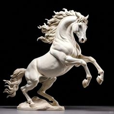 a statue of a white horse on its hind legs with long hair in the wind