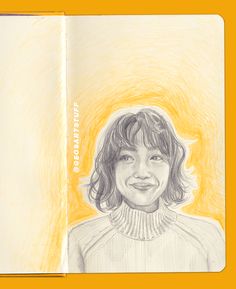 a drawing of a child's face is shown in an open book with yellow background