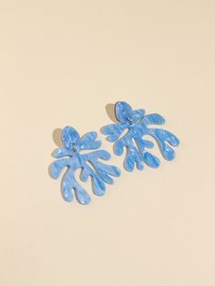 "Discover the essence of wearable art with our Matisse-inspired Statement Earrings. Drawing inspiration from the timeless cutouts of French artist Henri Matisse, these earrings boast contemporary abstract shapes that captivate the imagination. Laser-cut from premium acrylic, each pair is a testament to meticulous craftsmanship, ensuring a lightweight and flawless finish that seamlessly merges art and fashion.\" Embrace your unique style and make a bold statement with these handmade dangle drop earrings. Whether attending a gallery opening or simply adding flair to your everyday look, our Handmade Matisse-inspired statement earrings are the perfect accessory to elevate any ensemble. Step into a world of creativity and self-expression with these wearable works of art! ABOUT THE ITEM Details: Trendy Light Blue Drop Earrings, Trendy Light Blue Dangle Earrings, Modern Blue Earrings For Party, Artistic Blue Party Earrings, Trendy Blue Drop Earrings, Blue Artistic Design Earrings For Gift, Artistic Blue Earrings With Ear Wire, Artistic Blue Pierced Jewelry, Modern Light Blue Earrings Gift