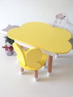 two children's tables and chairs in different colors