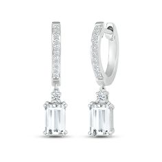 These mesmerizing earrings showcase a dangling emerald-cut white lab-created sapphire topped by a sparkling round white lab-created sapphire. The drop hangs from a sterling silver hoop adorned in more round white lab-created sapphires for all-over sparkle. The earrings secure with hinged backs. White Brilliant Cut Dangle Diamond Earrings, Luxury White Emerald Cut Earrings, Modern Baguette Cut White Diamond Earrings, Modern White Baguette Cut Diamond Earrings, Modern White Baguette Cut Earrings, Modern White Diamond Hoop Earrings, White Baguette Cut Diamond Earrings, White Diamond Emerald Cut Earrings, Timeless Emerald Cut Diamond White Earrings