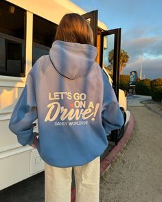 Presenting the "Let's Go on a Drive" hoodie. Late-night drives, gas station snacks, road trips, sunsets, good music, and meaningful conversations - my favorite memories happen behind the wheel. Features on the hoodie are embroidered with tackle twill suede fabric for maximum comfort. See product photos for up-close details. Dandy's Oversized Lux Hoodie line features a new fit entirely. A seamless shoulder means the hoodie falls over your arms like a warm hug. The wristband and waistband are upgr Cute Aesthetic Hoodies, Cute Graphic Hoodies, Cute Hoodies Aesthetic, Winter Clothes Aesthetic, Dandy Hoodie, Good Hoodies, Winter Hoodie Outfit, Gas Station Snacks, Dandy Worldwide