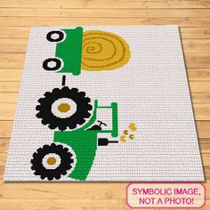 an image of a rug with a tractor on it