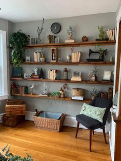 a living room filled with lots of shelves covered in plants and books on top of them