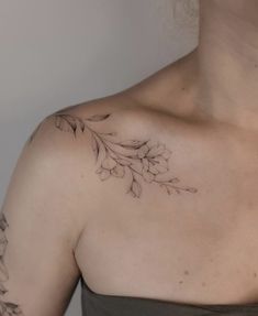 a woman with a tattoo on her chest