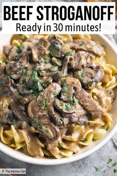 Beef stroganoff in white bowl. Title: Beef Stroganoff: Ready in 30 minutes! Beef Stroganoff With Steak, Beef Stroganoff Sour Cream, Golden Mushroom Beef Stroganoff, Beef Stroganoff Noodles And Company, Sunny’s Easy Beef Stroganoff, Beef Stroganoff With Golden Mushroom, Steak Stroganoff, Steak Mushrooms, Rustic Beef Stroganoff With Egg Noodles