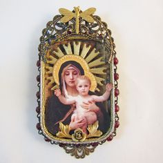 an image of the virgin mary holding a child in her arms on a white background