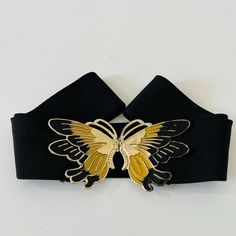 Vintage 1980's Black Expandable Stretch Belt Medium Size with Black and Gold Butterfly Metal Buckle 30" It is fully elastic which is expandable - 15" closed- 30" total & expandable to at least 38" Very Nice Metal Black & Gold Butterfly Buckle Width is 12" Lightly Used Please view pictures as part of the description. All vintage items are final sale. Please visit my other vintage collectibles in my shop : https://www.etsy.com/ca/shop/Sewfunky?ref=shop_sugg§ion_id=31004548 Butterfly Belt Buckle, Vintage Black Belt Buckles With Brass, Vintage Gold Jewelry With Butterfly Clasp, Vintage Black Adjustable Belt Buckles, Black Belt Gold Buckle, Stretch Belt, Gold Butterfly, Suspender Belt, Medium Size