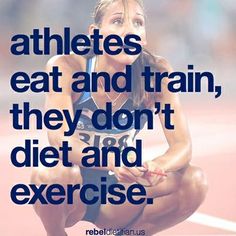 a woman sitting on top of a track with the words athletes eat and train, they don't diet and exercise