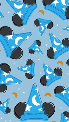 a blue and black pattern with stars, hats and crescents on it's sides