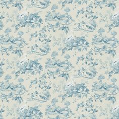 a blue and white wallpaper with birds on it