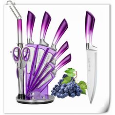 purple kitchen utensils with grapes and knifes next to them on a white background