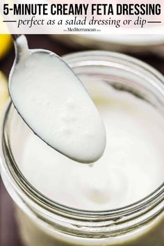 a spoon full of yogurt with the text 5 minute creamy feta dressing