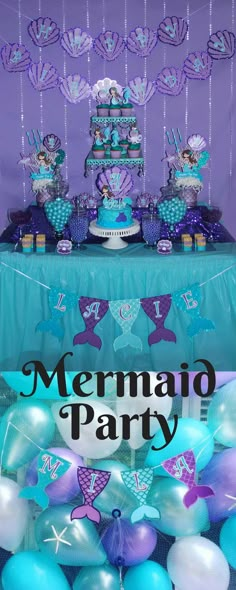 there is a mermaid party table with balloons