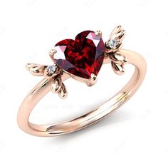 We are Pleased to welcome you in our Store-    TheLesBijoux Short Description about the item-  This ring is Made With a heart Cut Garnet Gemstone and the accented stones in this ring., are the moissanite to adorn the look of this beautiful ring ..a unique piece to wear occasionally or can be used regularly. Can be offered as a gift to your loved ones, to make them feel special. MATERIAL AVAILABILITY- ( 925 Sterling Silver/ 14k solid gold(white gold / rose gold / yellow gold?  950 Solid Platinum  We make sure that you know that you're getting high quality hand-made crafted jewelry when you purchase items from our store. This beautiful ring is made to order. Available in all the Required Materials. ( 925 Sterling Silver/ 14k/18k solid gold(white gold / rose gold / yellow gold can be made ), Ring For Women Unique, Garnet Wedding Rings, Garnet Wedding, Garnet Engagement Ring, Engagement Ring For Women, Ring Unique, Garnet Gemstone, Feel Special, Beautiful Ring