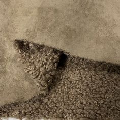 the corner of a carpet that has been torn off