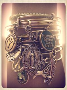 Alex and Ani bangles and charms. I could go crazy in their stores -- love it all! Stacked Bracelets, Stackable Bangles, I Love Jewelry, Blessed Mother, Charm Bangle, Mother Mary