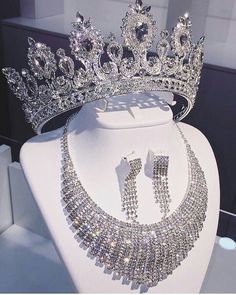 a tiara and earrings on display at a jewelry store