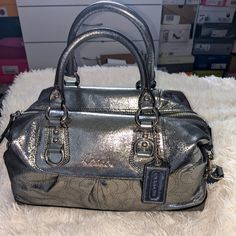 Metallic Pewter Handbag. Brand New Without Tags, Never Used. No Rips, Stains, Tears. Silver Satchel With Double Handle And Top Carry Handle, Silver Satchel With Double Handle, Silver Crossbody Satchel With Top Carry Handle, Designer Metallic Bag For Everyday Use, Silver Handheld Satchel For Travel, Elegant Metallic Satchel Bag, Elegant Silver Bags, Silver Tote Satchel With Detachable Strap, Silver Satchel Tote With Detachable Strap