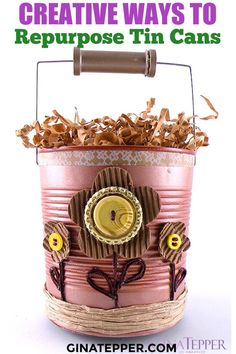 a pink tin can with some flowers in it and the words creative ways to repurpose tin cans